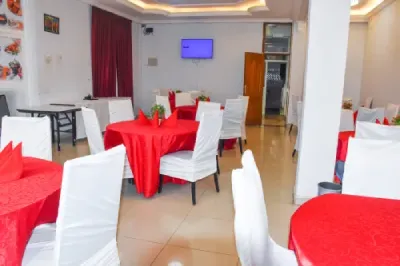 Lina Hotel Jimma, Dinning restaurant service room. Chairs and tables.