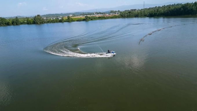 Boye Dam Recreation with a motorboat.